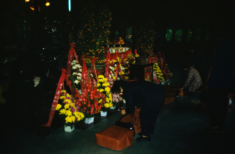 Woman worshiping in Po Lin Monastery