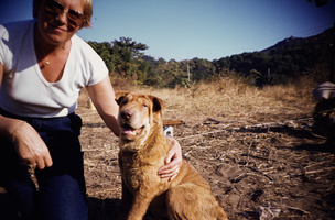 Jo and a dog in Chek Lap Kok